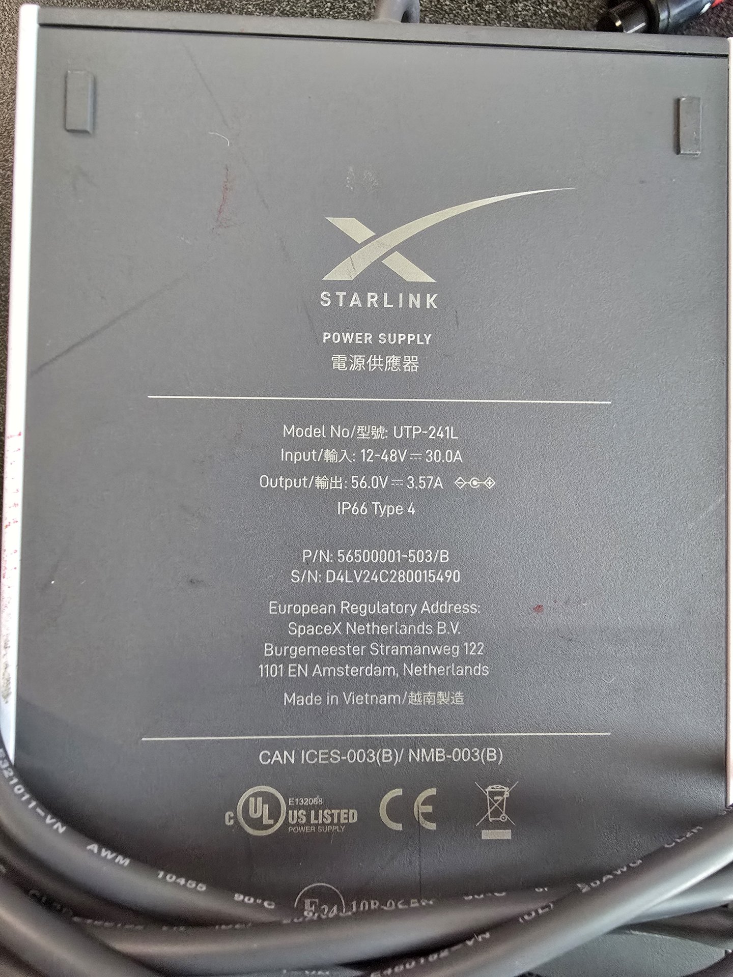 Starlink Power Supply UTP-241L label showing 12-48V DC input and 56V output